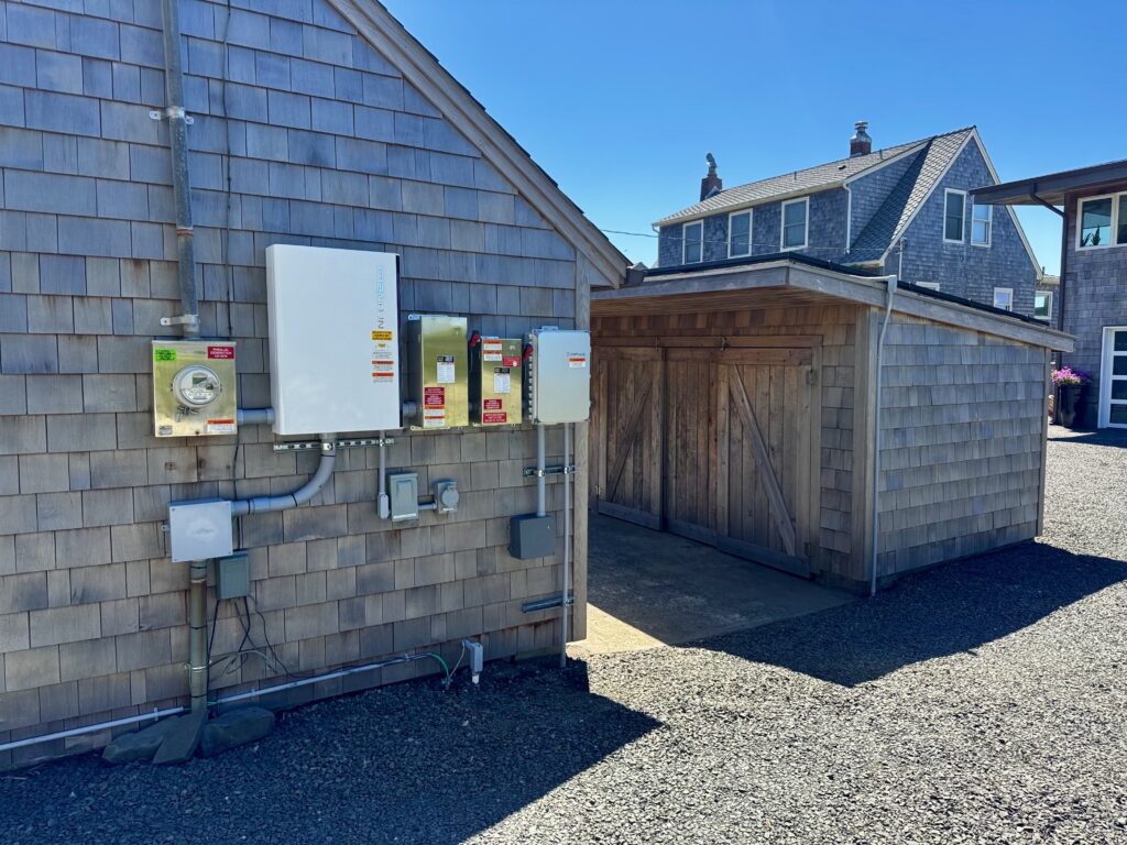 FranklinWH home energy equipment installed on the exterior wall of a residential home.